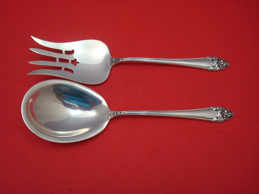 Reed & Barton Fragrance Sterling Silver Salad Serving Set 2pc 9 1/4": Reed & Barton Fragrance Sterling Silver Salad Serving Set 2pc 9 1/4" This exquisite 2-piece salad serving set features the elegant Fragrance pattern by Reed & Barton. Crafted from high-quality sterlin