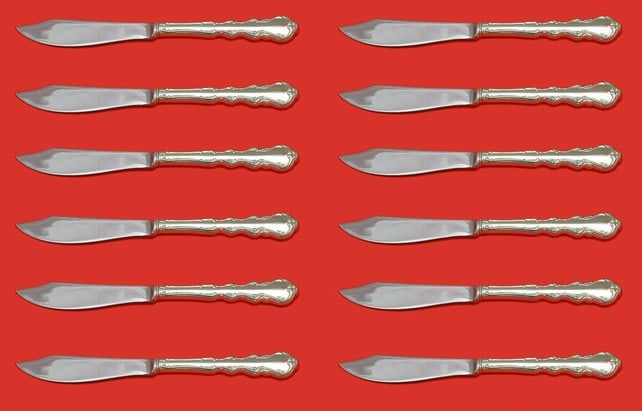 Angelique by International Sterling Silver Fish Knife Set 12pcs 8 1/4 inches: Angelique by International Sterling Silver Fish Knife Set 12pcs 8 1/4 inches Enhance your dining experience with this exquisite 12-piece set of Angelique fish knives by International Sterling. Crafted