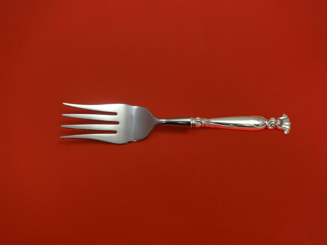 Wallace Romance of the Sea Sterling Silver Buffet Fork 8 3/4 Custom Made: Wallace Romance of the Sea Sterling Silver Buffet Fork 8 3/4 Custom Made This exquisite serving fork is part of the 'Romance of the Sea' pattern by Wallace. Crafted from high-quality sterling silver, 