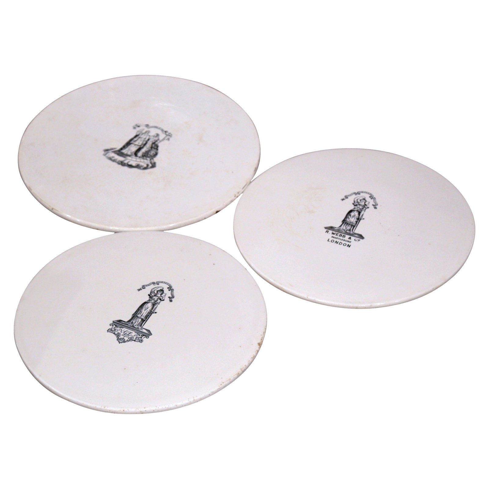 19th Century Set of 3 Hand-Painted English Trivets R. Webb & Co: 19th Century Set of 3 Hand-Painted English Trivets R. Webb & Co This exquisite set of three late 19th century trivets, crafted in England circa 1870, showcases traditional ceramic artistry. Each trive