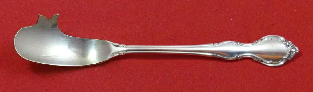 Alvin Pirouette Sterling Silver Cheese Knife with Pick 5 3/4: Alvin Pirouette Sterling Silver Cheese Knife with Pick 5 3/4 Sterling silver cheese knife with pick in the Pirouette pattern by Alvin. This custom-made flat handle, all-sterling piece measures 5 3/4 i