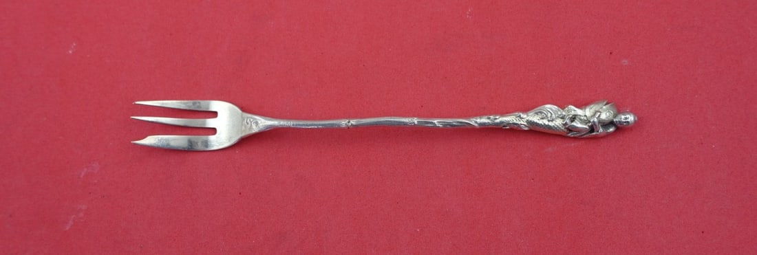 Gorham Hizen Sterling Silver Cocktail Fork Man on Koi Handle 6": Gorham Hizen Sterling Silver Cocktail Fork Man on Koi Handle 6" This exquisite cocktail fork from the Hizen pattern by Gorham features a detailed handle depicting a man riding a koi fish. Made from hi