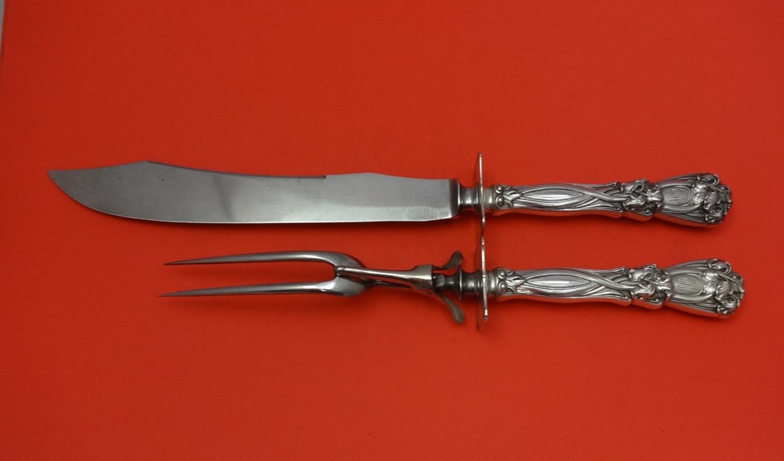 Durgin-Gorham Iris Sterling Silver Carving Set 2pc 15": Durgin-Gorham Iris Sterling Silver Carving Set 2pc 15" This exquisite 2-piece roast carving set is crafted from sterling silver by Durgin-Gorham, featuring the elegant Iris pattern. The set includes h