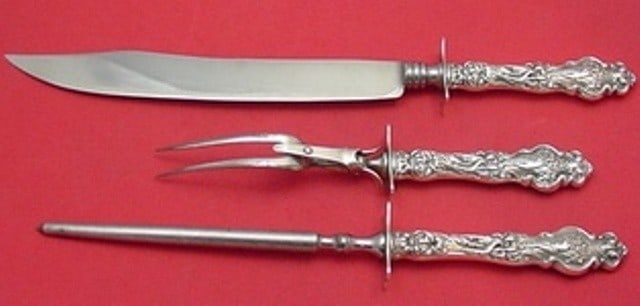 Wallace Irian 3 Piece Sterling Silver Roast Carving Set 15 Inch: Wallace Irian 3 Piece Sterling Silver Roast Carving Set 15 Inch This Irian by Wallace roast carving set features three pieces crafted in the Art Nouveau style. Each utensil has a sterling silver hollo