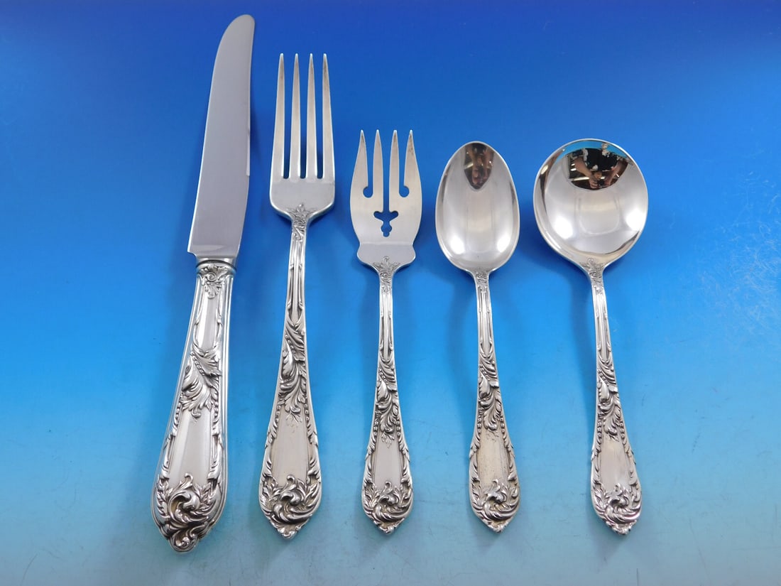 Romaine Sterling Silver Reed Barton 64 Piece Flatware Service for 12: Romaine Sterling Silver Reed Barton 64 Piece Flatware Service for 12 This is a 64-piece dinner-size flatware set in the Romaine pattern by Reed & Barton, crafted from sterling silver and dating to aro