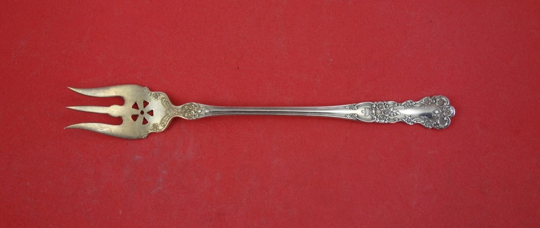 Gorham Buttercup Sterling Silver Oyster Fork Gold Wash 5 3/4: Gorham Buttercup Sterling Silver Oyster Fork Gold Wash 5 3/4 This is a Gorham sterling silver oyster fork in the Buttercup pattern, featuring a gold wash finish and a distinctive ball on the center ti