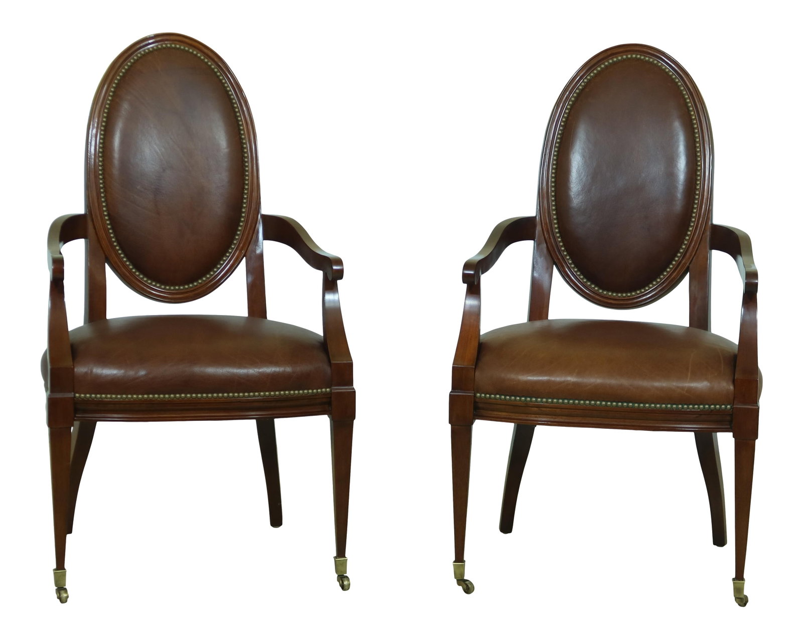 Councill Craftsmen Brown Leather Open Armchairs with Brass Feet: Councill Craftsmen Brown Leather Open Armchairs with Brass Feet This elegant pair of Councill Craftsmen open armchairs features a rich brown leather upholstery, showcasing high-quality construction an
