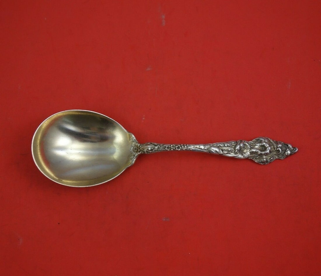 Reed and Barton Les Six Fleurs Sterling Silver Berry Spoon 8 Inch Gold Wash: Reed and Barton Les Six Fleurs Sterling Silver Berry Spoon 8 Inch Gold Wash Discover the elegance of the Les Six Fleurs Berry Spoon by Reed and Barton, crafted from high-quality sterling silver. This 