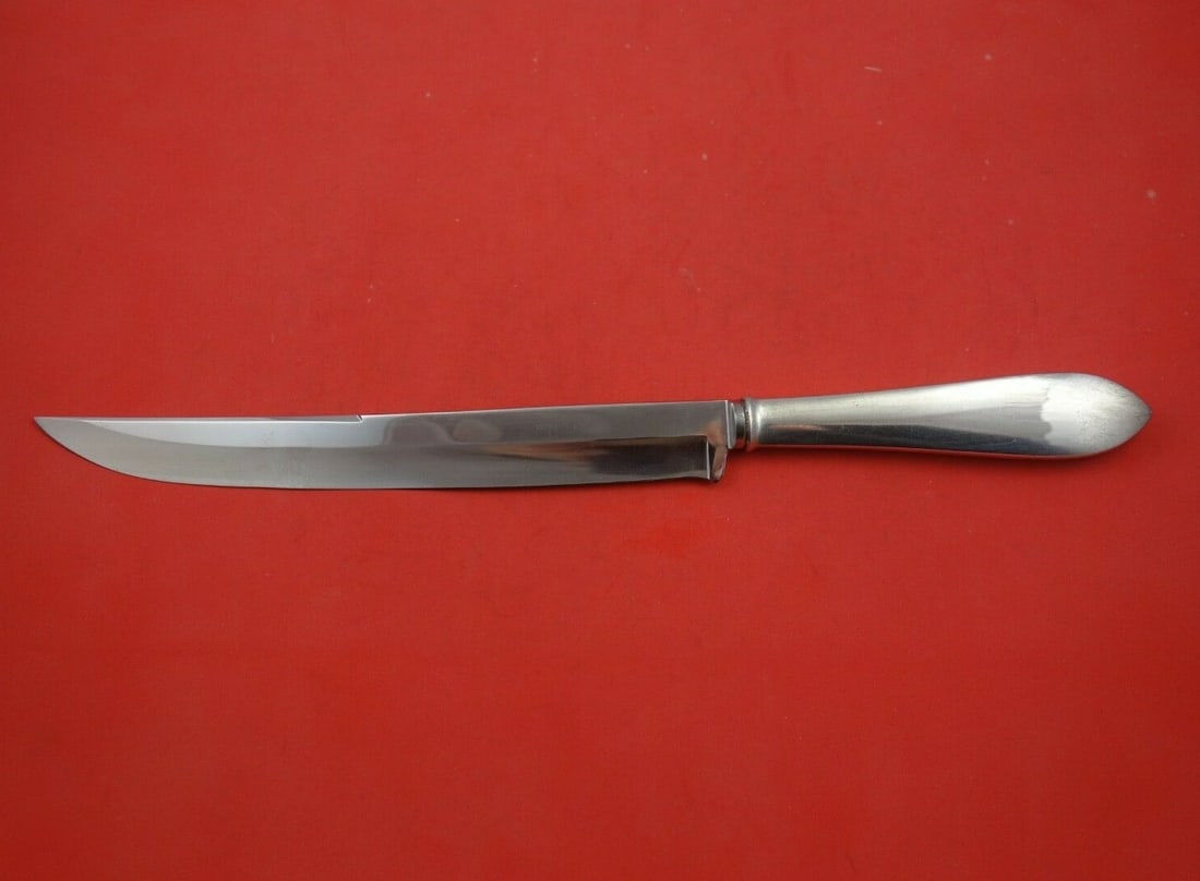 Tiffany & Co Faneuil Sterling Silver Roast Carving Knife 14 inch: Tiffany & Co Faneuil Sterling Silver Roast Carving Knife 14 inch Introducing the Faneuil Roast Carving Knife by Tiffany & Co., an exquisite piece crafted from sterling silver. This heirloom knife show