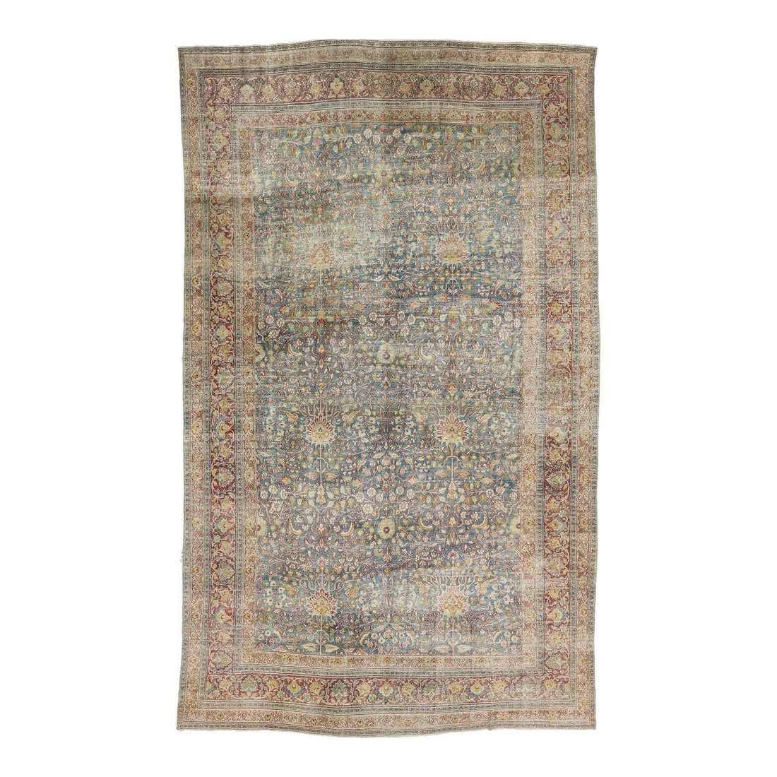 10'3" x 17'1" Antique Mashad Wool Rug in Muted Blue: 10'3" x 17'1" Antique Mashad Wool Rug in Muted Blue Turn-of-the-century antique Mashad rug with an allover field of scrolling vines, delicate arabesques, and oversized Shah Abbasi palmettes. It is han