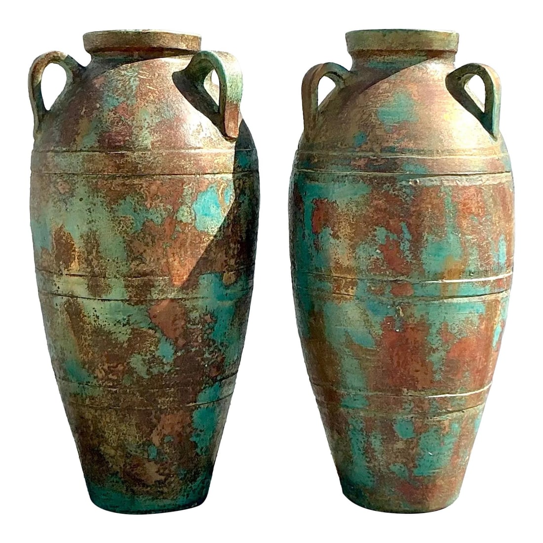 Pair of Vintage Boho Patinated Terra Cotta Urns: Pair of Vintage Boho Patinated Terra Cotta Urns Enhance your home decor with this stunning pair of vintage boho patinated terra cotta urns. Each urn showcases beautifully aged surfaces and a timeless 