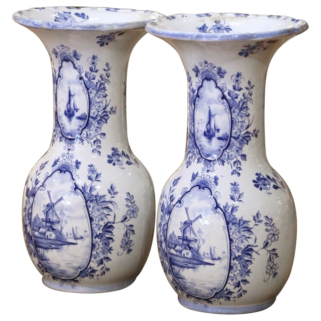 Set of 2 Dutch Delft Faience Baluster Vases with Sailboat and Windmill Scenes: Set of 2 Dutch Delft Faience Baluster Vases with Sailboat and Windmill Scenes This elegant pair of early 20th century Dutch Delft faience vases features a classic baluster form with bulbous bodies, lo