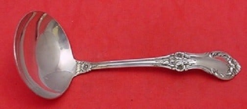 International Sterling Silver Wild Rose Gravy Ladle 6 3/8 Vintage: International Sterling Silver Wild Rose Gravy Ladle 6 3/8 Vintage This vintage gravy ladle, crafted in sterling silver, features the elegant Wild Rose pattern by International Silver. Measuring 6 3/8 
