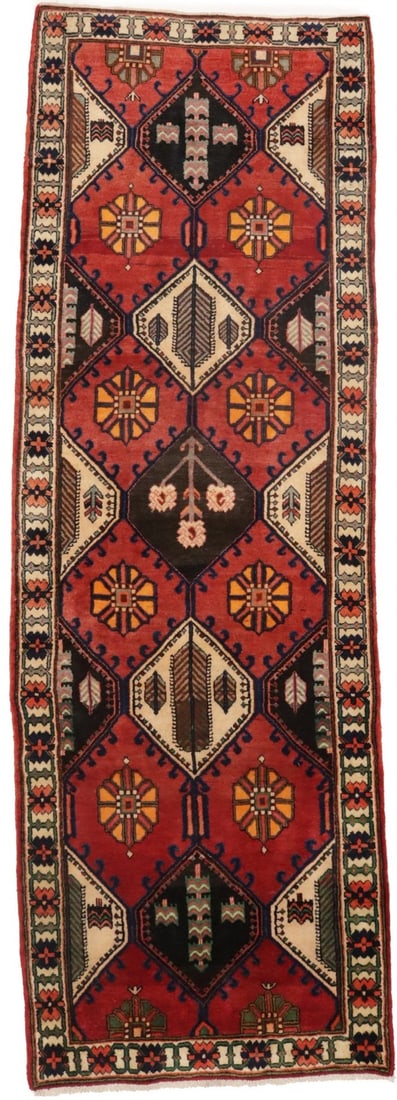 Wool Hand-Knotted Floral Runner Rug 3'5 x 10'3 Vintage: Wool Hand-Knotted Floral Runner Rug 3'5 x 10'3 Vintage This handmade vintage Oriental runner rug features a floral pattern in rusty red, cream, dark brown, purple-navy, gold, coral, and gray tones. Ex