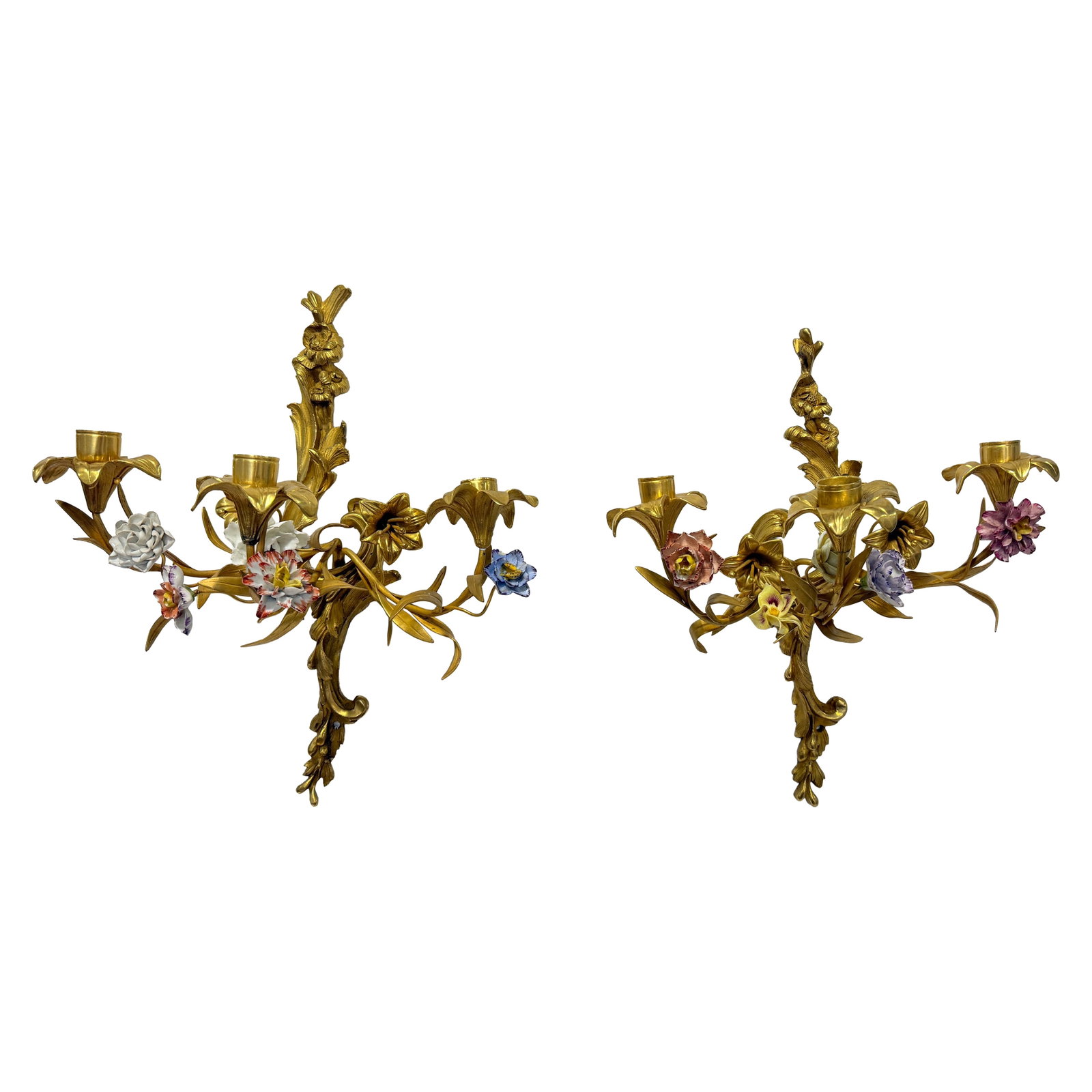 Set of Two 19th Century French Gilt Bronze Sconces with Porcelain Flowers: Set of Two 19th Century French Gilt Bronze Sconces with Porcelain Flowers This pair of French Rococo Revival wall-mounted candle sconces from the 19th century features gilt bronze construction adorned