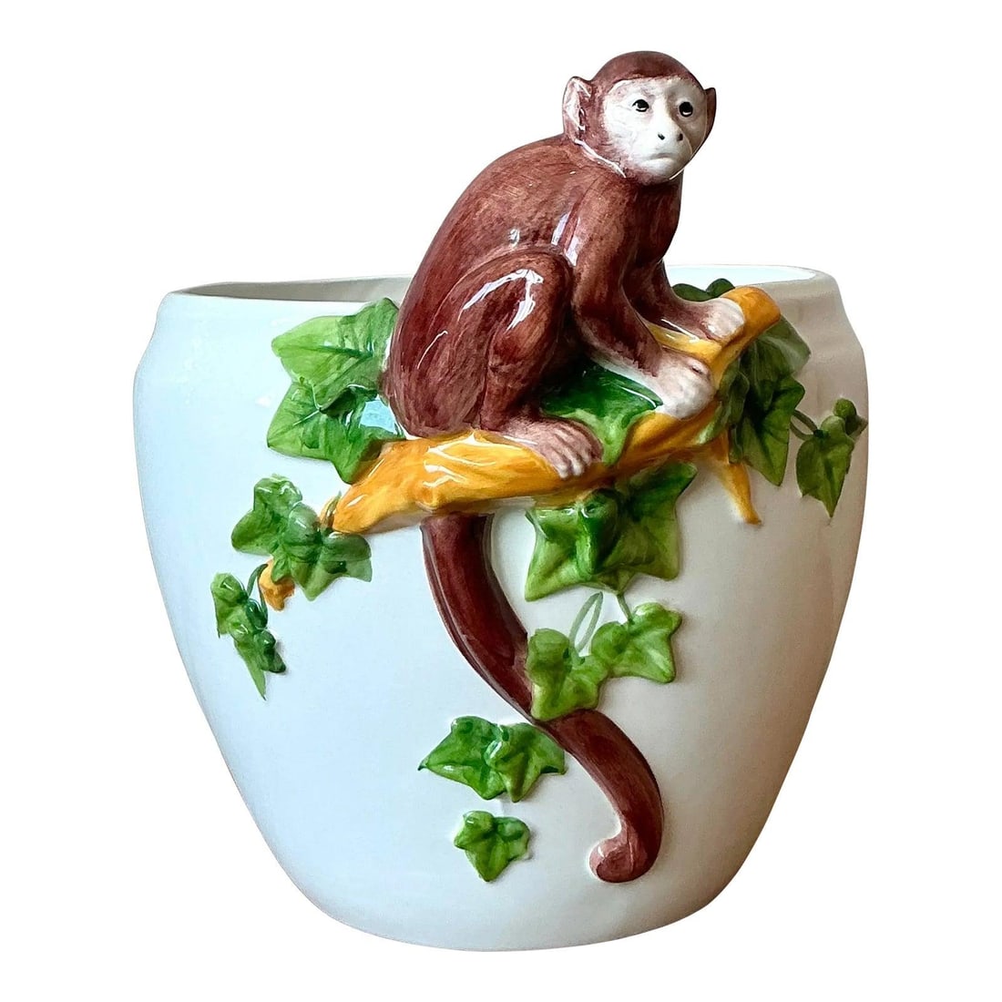 Italian Glazed Ceramic Cache Pot with Sculpted Monkey and Ivy Motif: Italian Glazed Ceramic Cache Pot with Sculpted Monkey and Ivy Motif This vintage Italian Oggetti cache pot showcases a playful glazed ceramic monkey perched among lush green ivy. Featuring a high-glos