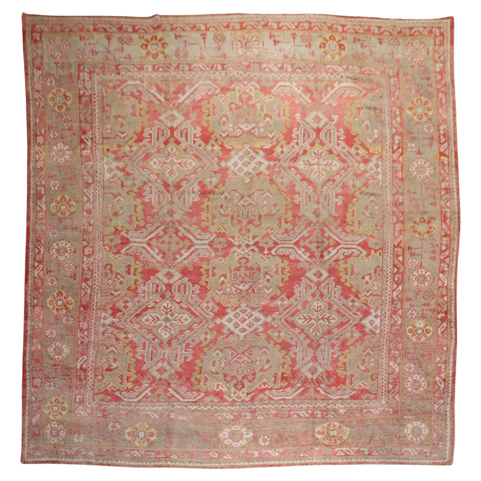 Zabihi Collection Antique Oushak Rug 137 x 166 Wool Hand-Woven Turkey: Zabihi Collection Antique Oushak Rug 137 x 166 Wool Hand-Woven Turkey This stunning oversize antique Oushak rug is a remarkable piece from the early 20th century, crafted around 1900 in Turkey. It fea