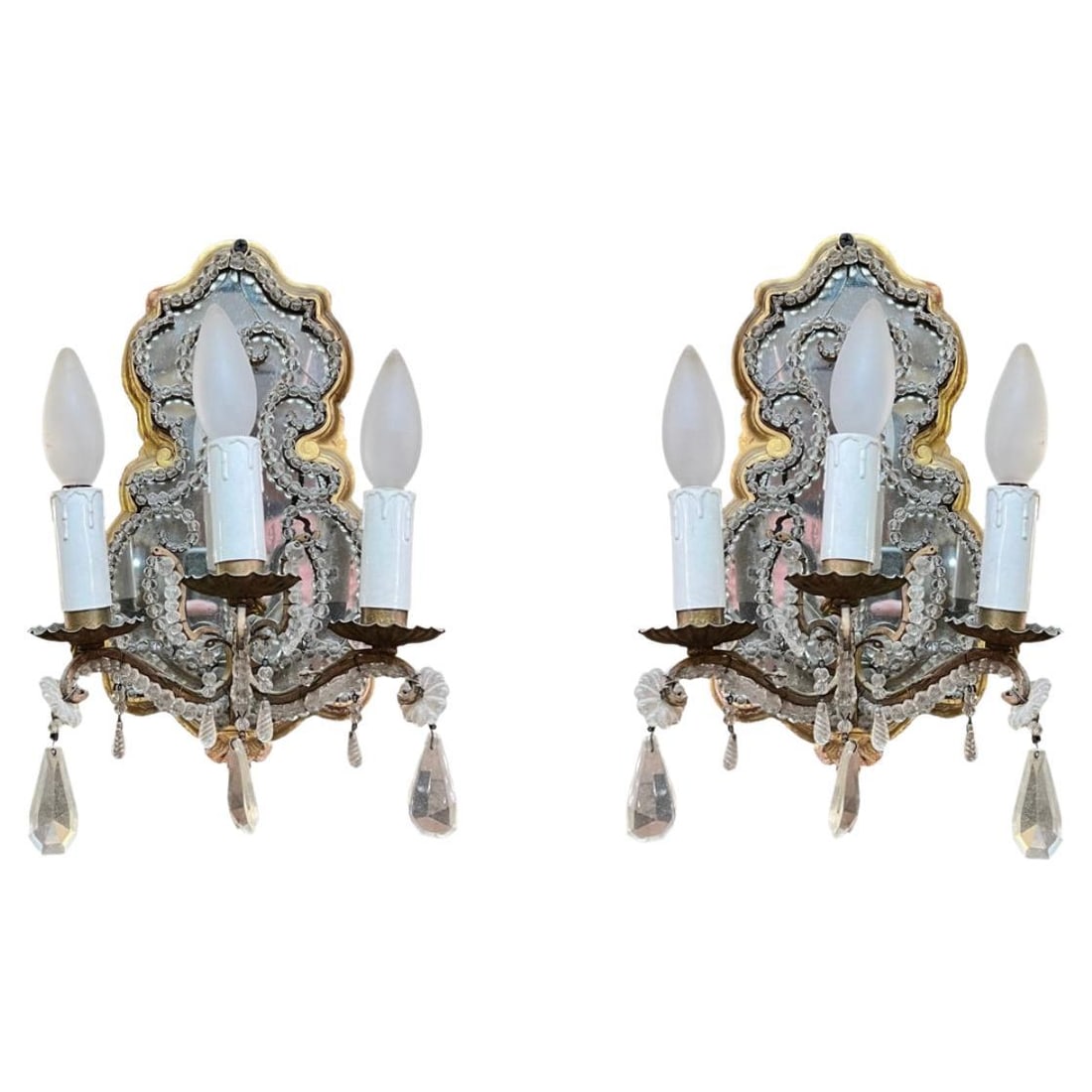 Set of Two Louis XVI French Mirrored Giltwood Wall Lights with Crystal Drops: Set of Two Louis XVI French Mirrored Giltwood Wall Lights with Crystal Drops This pair of late 19th century French mirrored giltwood wall sconces features three electrified metal candle arms on each s