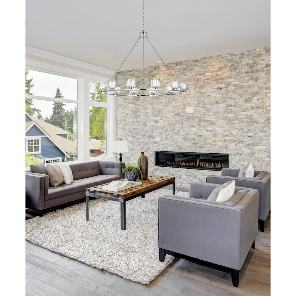 Cadence 12 Light Chrome Glass Chandelier 48 in: Cadence 12 Light Chrome Glass Chandelier 48 in Pre-owned 12-light chandelier with a chrome-plated finish and glass shades. It features a farmhouse style, hardwired installation, adjustable height, and