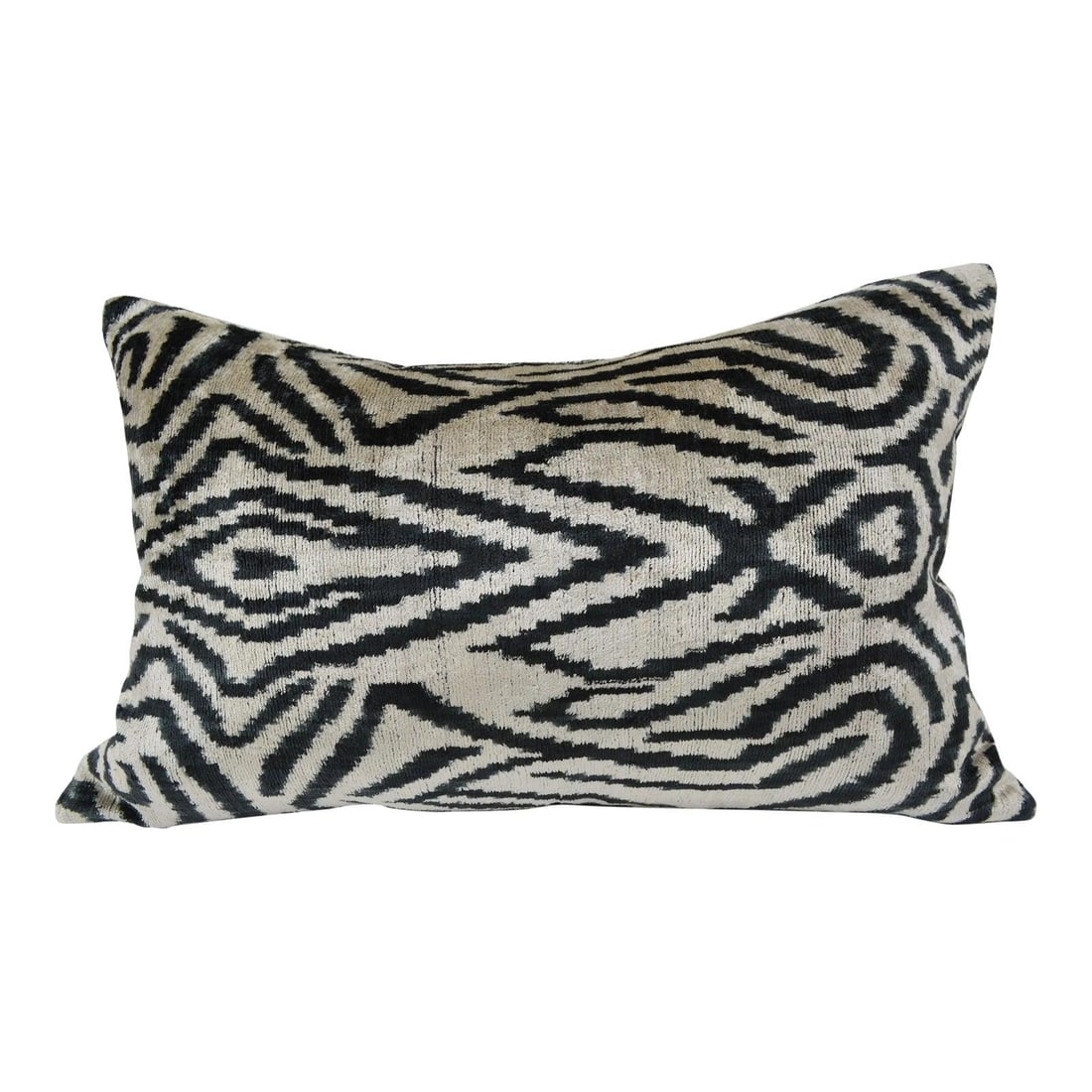 Handcrafted Ikat Velvet Pillow With Silk and Linen Backing: Handcrafted Ikat Velvet Pillow With Silk and Linen Backing This hand made pillow cushion features a silk Uzbek Ikat velvet front, complemented by a natural linen backing and a hidden zipper. It comes 