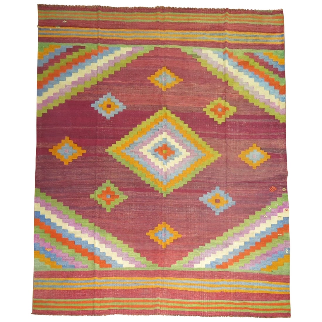 Hand Knotted Wool Turkish Kilim Room Size Rug: Hand Knotted Wool Turkish Kilim Room Size Rug This vintage Turkish Kilim flat-weave carpet is a handmade piece from the mid-20th century, crafted in Turkey around 1950-1960. Featuring a cheerful color