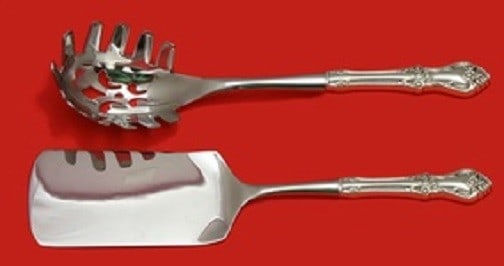 2 Piece Italian Serving Set Oneida Afterglow Sterling Silver: 2 Piece Italian Serving Set Oneida Afterglow Sterling Silver A 2-piece Italian serving set in the Afterglow pattern by Oneida. The set features sterling silver custom-made hollow handles with stainles