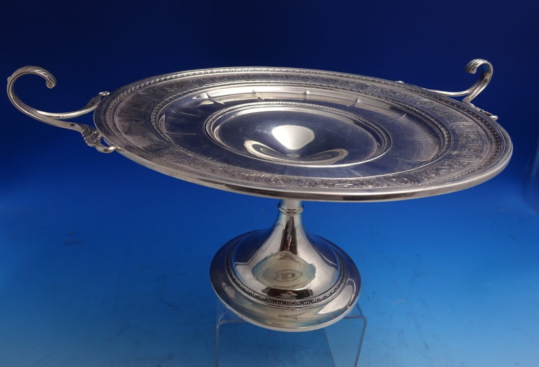 Sterling Silver Pedestal Centerpiece with Looped Handles Wedgwood Pattern: Sterling Silver Pedestal Centerpiece with Looped Handles Wedgwood Pattern This Wedgwood by International Sterling Silver centerpiece features a classic Grecian motif with a delicately scrolled relief 