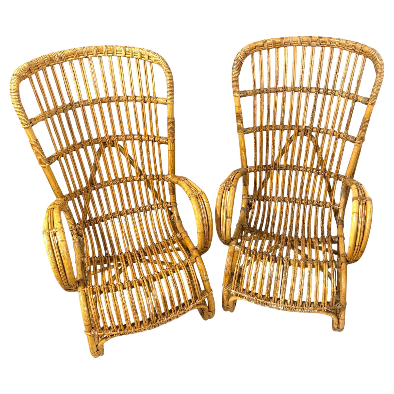 Set of 2 Italian Rattan High-Back Lounge Chairs in the Style of Franco Albini: Set of 2 Italian Rattan High-Back Lounge Chairs in the Style of Franco Albini This pair of Italian mid-century high-back lounge chairs is crafted in the style of Franco Albini and dates to the 1950s. 