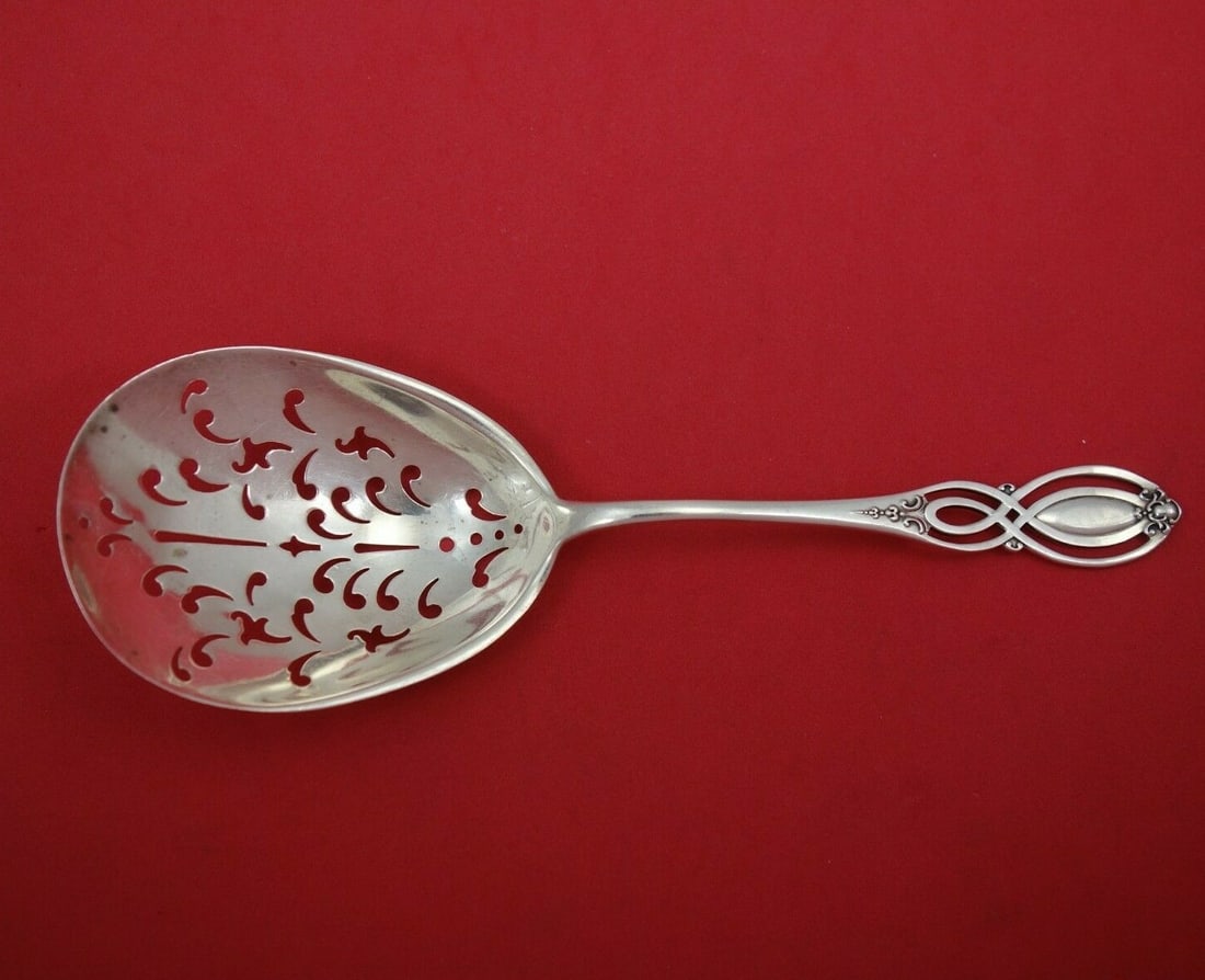 Alvin Chippendale Old Sterling Silver Ice Spoon 7.5" Antique Serving: Alvin Chippendale Old Sterling Silver Ice Spoon 7.5" Antique Serving This exquisite serving spoon, crafted in the early 20th century, showcases the elegant Chippendale Old pattern by Alvin. Made from 