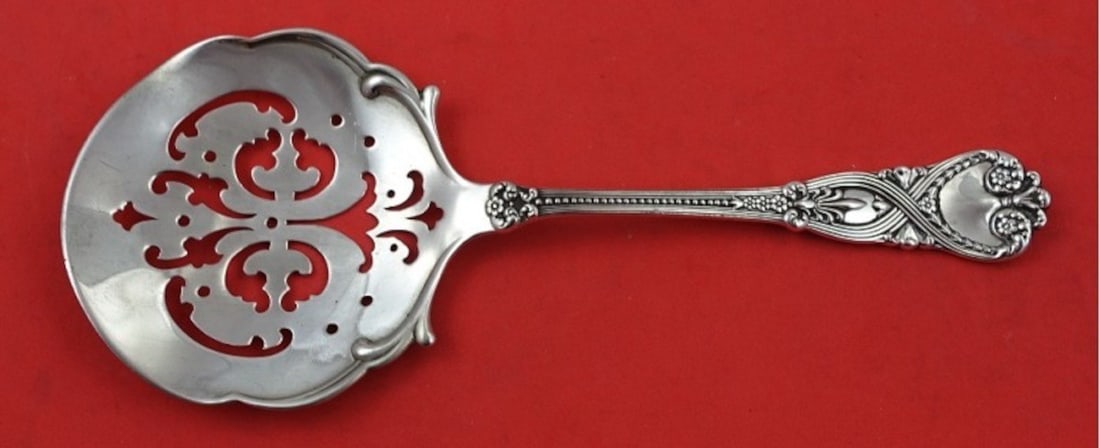 Tiffany & Co Saint James Sterling Silver Tomato Server 7.75": Tiffany & Co Saint James Sterling Silver Tomato Server 7.75" This exquisite tomato server from the Saint James pattern by Tiffany & Co. is crafted from high-quality sterling silver. Measuring 7 3/4 in
