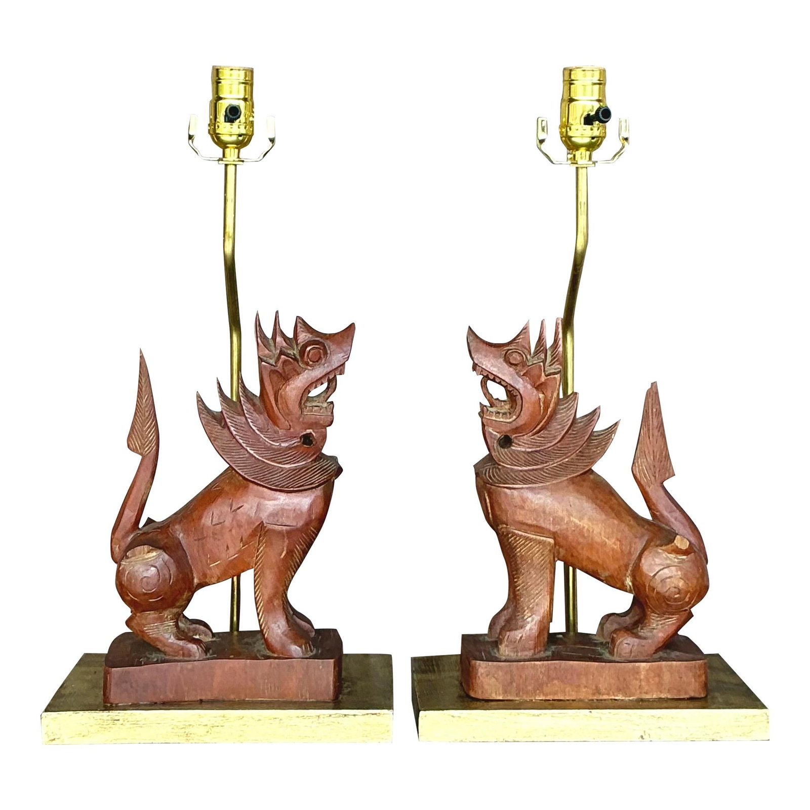 Pair of Vintage Boho Carved Wood Lion Lamps: Pair of Vintage Boho Carved Wood Lion Lamps Enhance your home decor with this captivating pair of Vintage Boho Carved Wood Lion Lamps. Each lamp showcases exquisite hand-carved detailing in the lion f