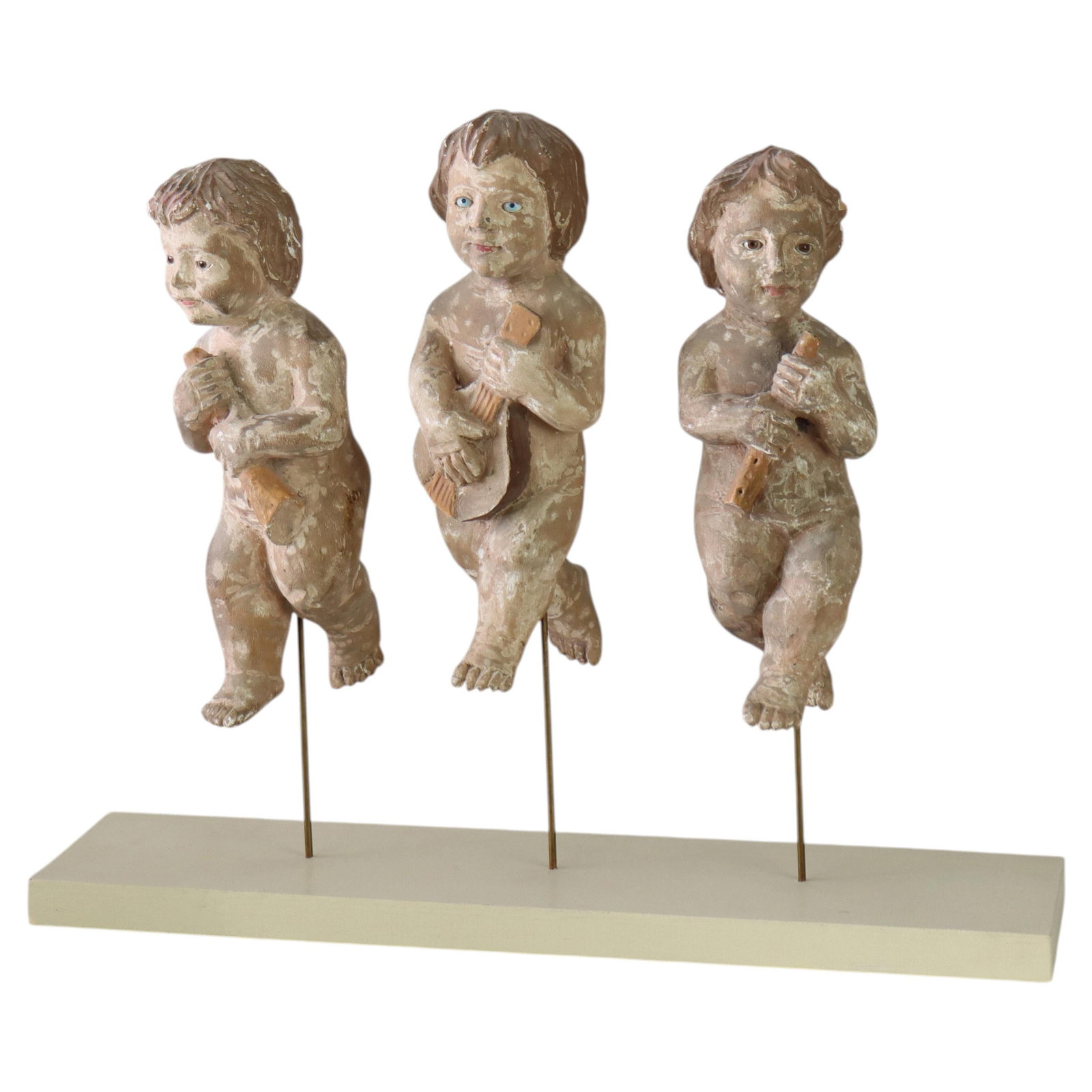 Set of 3 Italian carved wood putti musicians c1920: Set of 3 Italian carved wood putti musicians c1920 This set of three antique Italian carved wood putti musician figures dates to around 1920. Each hand-carved cherub features a painted finish and expr