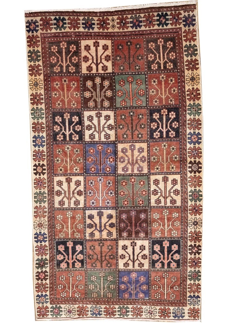 Hand-Knotted Wool Floral Tribal Area Rug 4'11 x 9'0: Hand-Knotted Wool Floral Tribal Area Rug 4'11 x 9'0 This semi-antique Oriental rug features a distressed floral pattern in a vibrant mix of red, cream, green, blue, dark brown, and other colors. Hand-