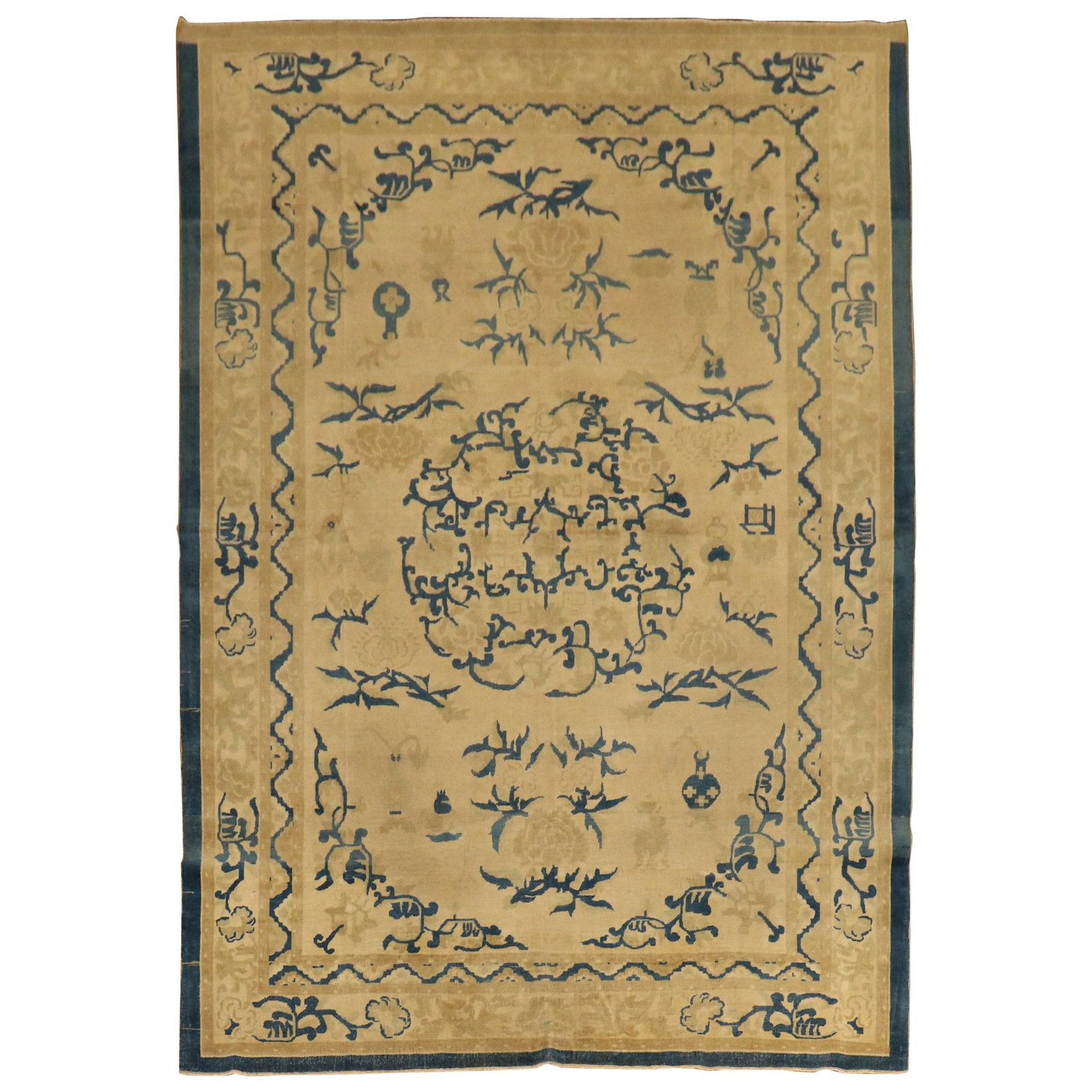 Antique Indo-Chinese Hand-Woven Wool Rug 78 x 112 in: Antique Indo-Chinese Hand-Woven Wool Rug 78 x 112 in This exquisite late 19th-century Indo-Chinese rug features a fine hand-woven design that showcases a decorative beige oval-shaped field accented wi