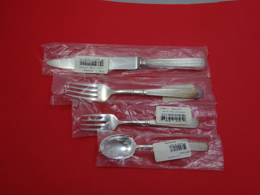 Wallace Acropole Sterling Silver 4-Piece Dinner Place Setting: Wallace Acropole Sterling Silver 4-Piece Dinner Place Setting Enhance your dining experience with the exquisite Acropole dinner place setting by Wallace. This 4-piece flatware set is crafted from high