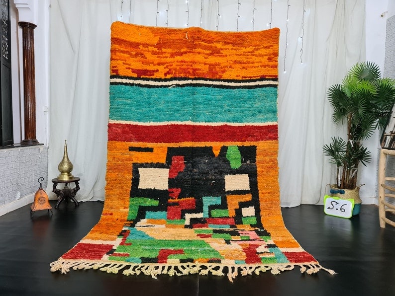 Authentic Handwoven Moroccan Berber Wool Rug 10 x 5 Feet: Authentic Handwoven Moroccan Berber Wool Rug 10 x 5 Feet Enhance your living space with this stunning, authentic handmade Moroccan Berber wool rug. Expertly crafted by local Berber women weavers in th