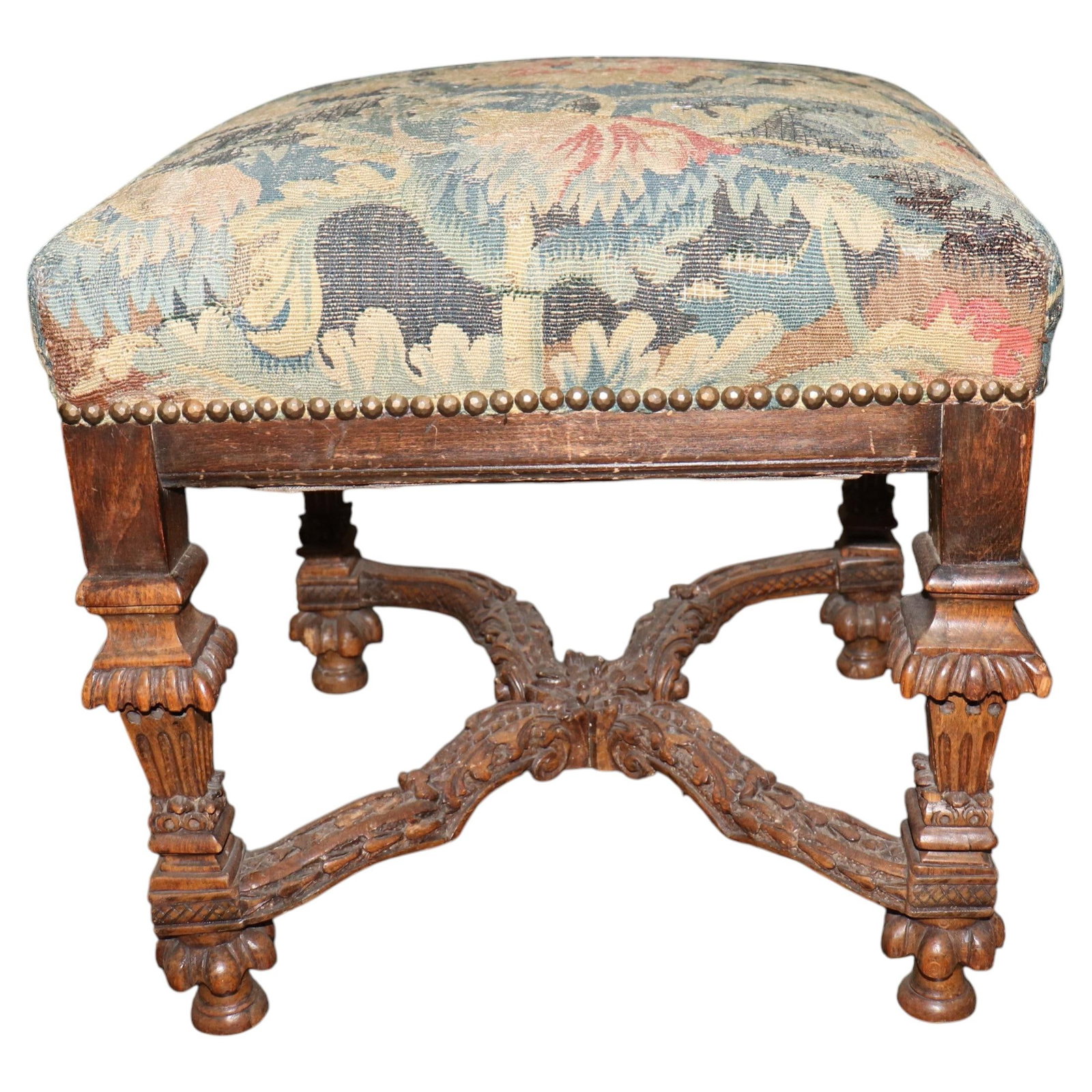 Mid 19th Century Aubusson Tapestry Footstool: Mid 19th Century Aubusson Tapestry Footstool This antique French stool from the mid-19th century showcases exceptional craftsmanship and refined design. Crafted in Southern France around 1850, the sto