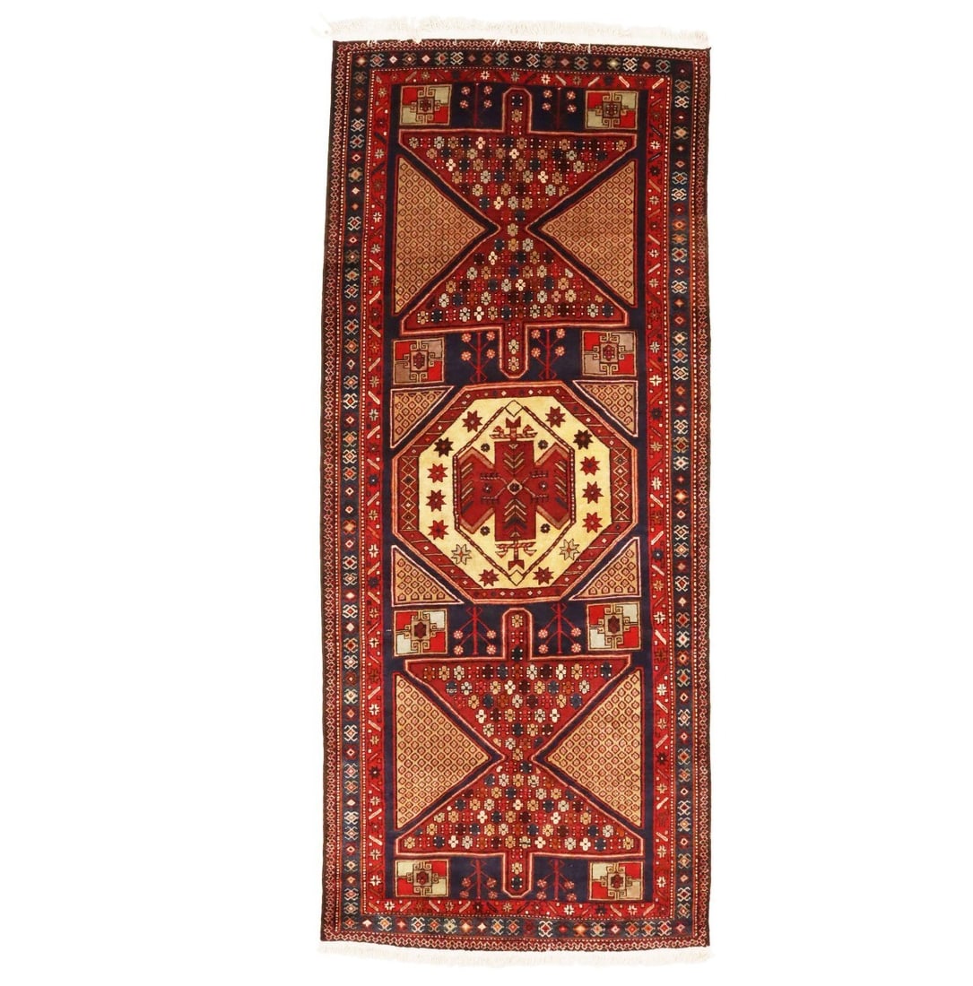 Heriz Wool Geometric Runner 4'5 x 10'8 Vintage Tribal Hand Knotted: Heriz Wool Geometric Runner 4'5 x 10'8 Vintage Tribal Hand Knotted This vintage Heriz runner features a geometric pattern with muted shades of red, plum, beige, cream, and tan. Hand-knotted in Western