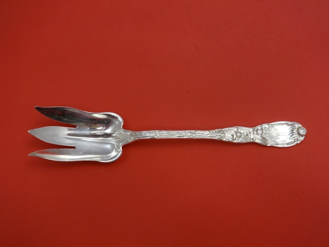 Sterling Silver Salad Fork in Chrysanthemum Pattern by Tiffany & Co 10 1/4 Inch: Sterling Silver Salad Fork in Chrysanthemum Pattern by Tiffany & Co 10 1/4 Inch This is a Tiffany & Co. Chrysanthemum pattern sterling silver salad serving fork featuring a 3-tine design. Crafted in t