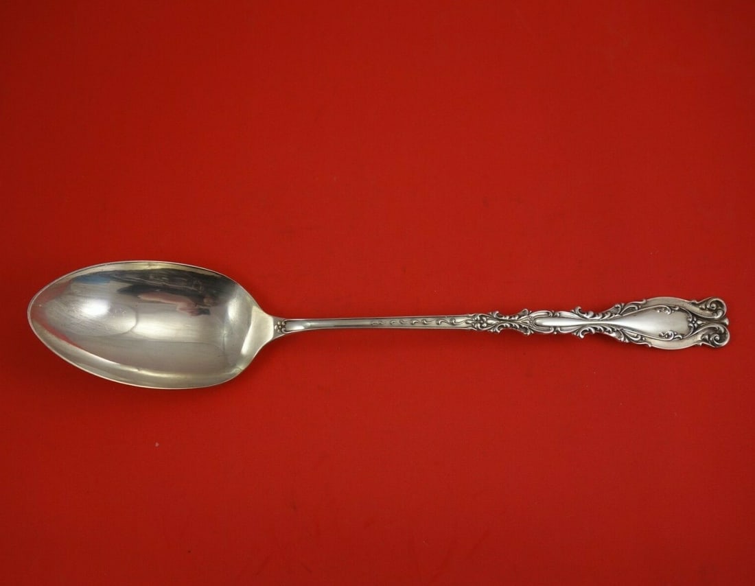 Frank Whiting Josephine Sterling Silver Stuffing Spoon 12 1/2": Frank Whiting Josephine Sterling Silver Stuffing Spoon 12 1/2" This exquisite stuffing spoon, crafted in sterling silver, showcases the elegant Josephine pattern by Frank Whiting. Measuring 12 1/2 inc
