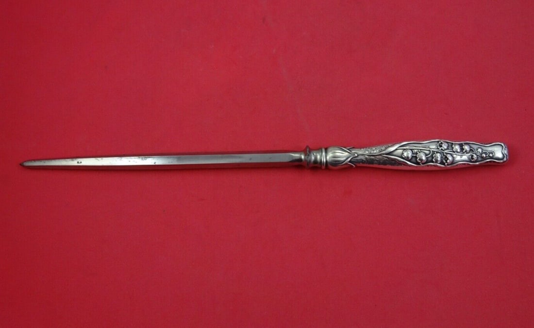 Whiting Lily of the Valley Sterling Silver Roast Carving Hone 13 3/4": Whiting Lily of the Valley Sterling Silver Roast Carving Hone 13 3/4" This exquisite Roast Carving Hone from the Lily of the Valley pattern by Whiting showcases the elegance of 19th-century craftsmans