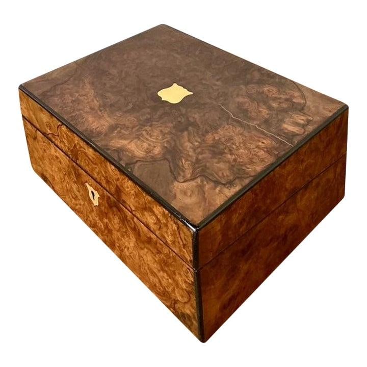 Victorian burl wood lap desk with brass inlay and inkwell: Victorian burl wood lap desk with brass inlay and inkwell This Victorian-era traveling writing desk showcases exquisite 19th-century craftsmanship, featuring a burl wood veneer with a striking swirlin