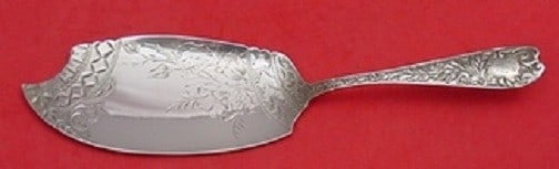 Knowles Aeolian Sterling Silver Ice Cream Slice Bright-Cut 10 5/8": Knowles Aeolian Sterling Silver Ice Cream Slice Bright-Cut 10 5/8" Presenting a stunning ice cream slice from the Aeolian pattern by Knowles, expertly crafted from sterling silver. This beautiful piec