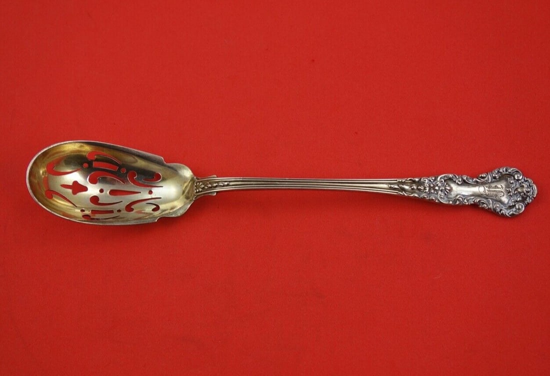 Durgin Hampshire Sterling Silver Olive Spoon Gold Wash 6 1/8": Durgin Hampshire Sterling Silver Olive Spoon Gold Wash 6 1/8" This exquisite Hampshire by Durgin olive spoon is crafted from sterling silver and features a gold wash finish. Measuring 6 1/8" in length