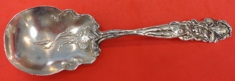 Sterling Silver Raphael Pattern Berry Serving Spoon with Iris by Alvin 9.25 Inch: Sterling Silver Raphael Pattern Berry Serving Spoon with Iris by Alvin 9.25 Inch This is a sterling silver berry spoon featuring a detailed iris and woman motif at the top of the handle, crafted in th