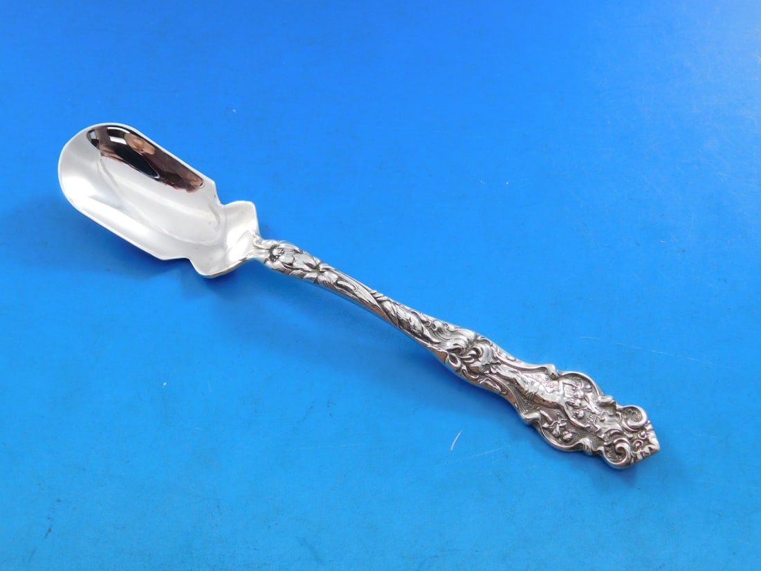Wallace Irian Sterling Silver 6" Horseradish Scoop Serving Piece: Wallace Irian Sterling Silver 6" Horseradish Scoop Serving Piece This exquisite horseradish scoop is crafted from sterling silver and features the elegant Irian pattern by Wallace. Measuring 6 inches 