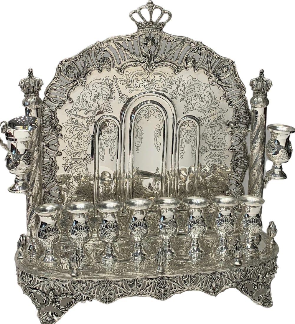 Handcrafted 925 Sterling Silver Backwall Menorah With Ornate Swirl Crown Design: Handcrafted 925 Sterling Silver Backwall Menorah With Ornate Swirl Crown Design This fine large Menorah from Turkiye is crafted from 925 sterling silver and features a handmade ornate chased swirl des
