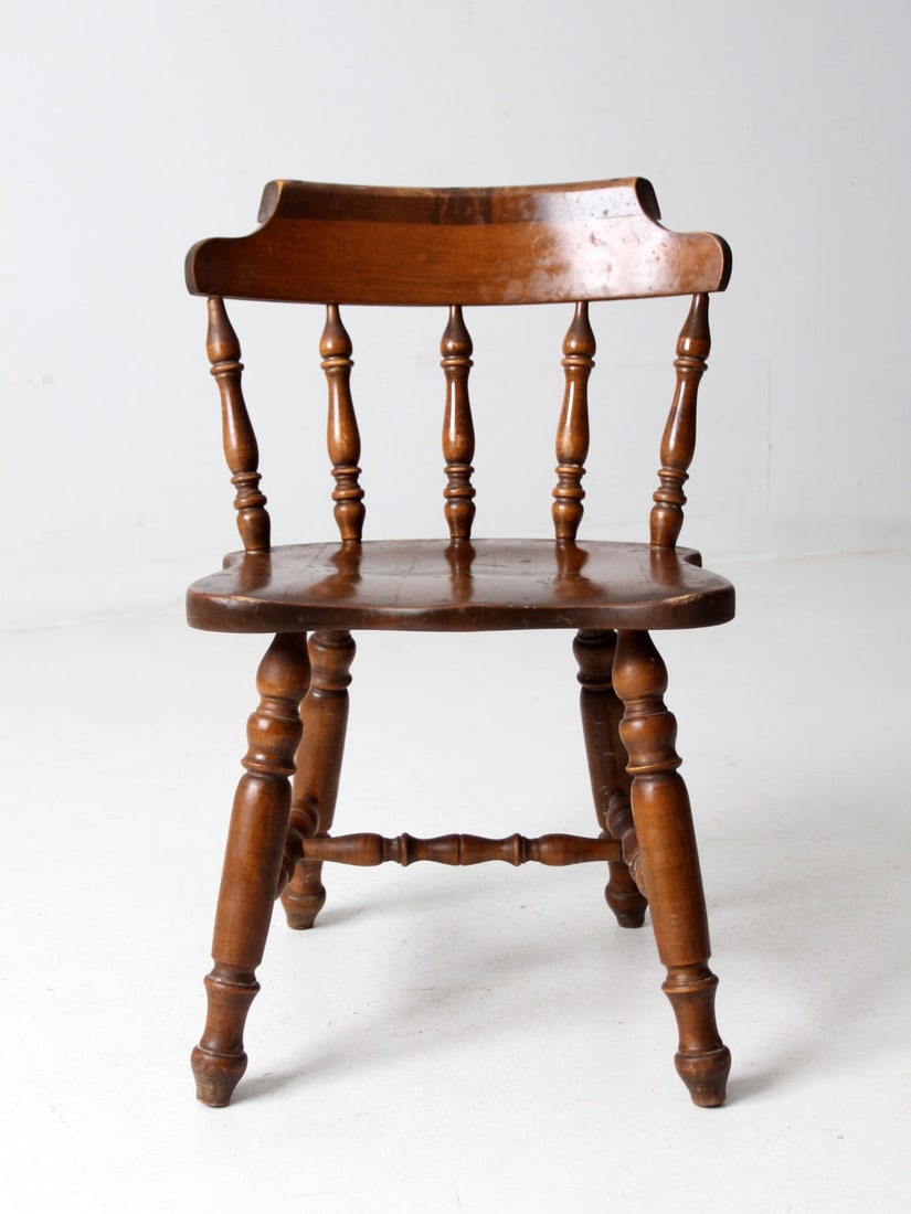 Timeless Vintage Wooden Pub Chair with Rich Patina: Timeless Vintage Wooden Pub Chair with Rich Patina Enhance your space with this vintage wooden pub chair that exudes timeless charm. Crafted from quality wood, it features sturdy turned legs and class