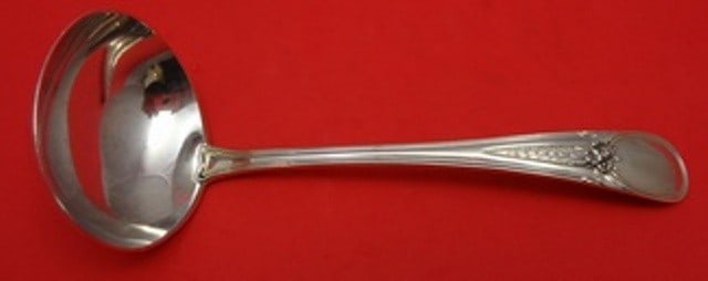 Blackinton Flowered Antique Sterling Silver Gravy Ladle 6.25": Blackinton Flowered Antique Sterling Silver Gravy Ladle 6.25" Add a touch of elegance to your dining experience with this exquisite Flowered Antique Gravy Ladle by Blackinton. Crafted from high-qualit