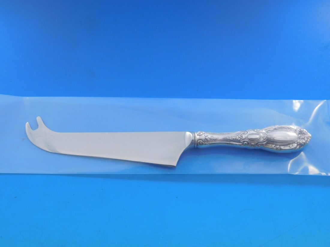 Towle King Richard Sterling Silver Cheese Knife 7 1/4" Custom Hollow Handle: Towle King Richard Sterling Silver Cheese Knife 7 1/4" Custom Hollow Handle Elevate your dining experience with this exquisite King Richard Cheese Knife by Towle. Crafted from sterling silver, this cu